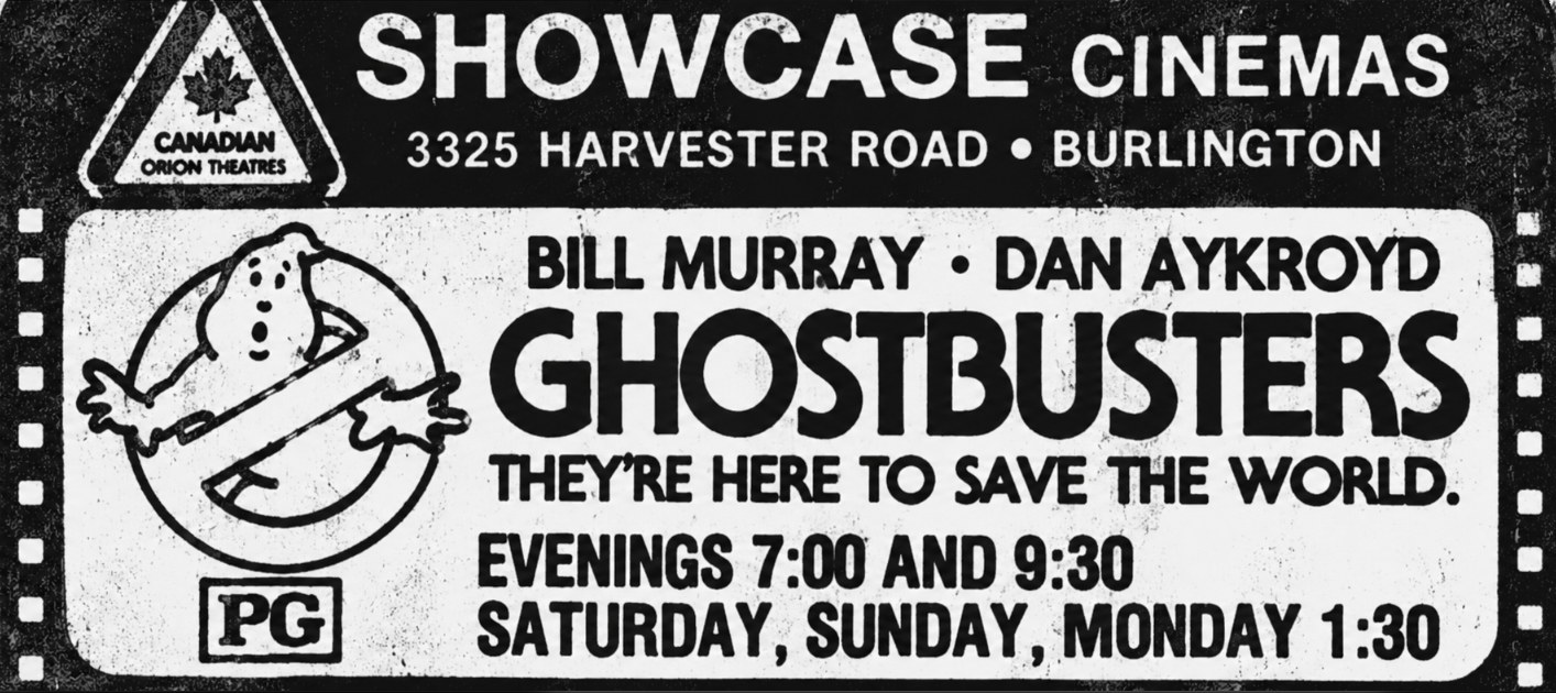 Newspaper ad for Showcase Cinemas, 3325 Harvester Road, Burlington, with the Canadian Odeon Theatres logo inside a film-strip border. It shows Ghostbusters starring Bill Murray and Dan Aykroyd, rated PG, with the no-ghost logo and the line 'They're here to save the world'; evenings 7:00 and 9:30, Saturday, Sunday and Monday 1:30.