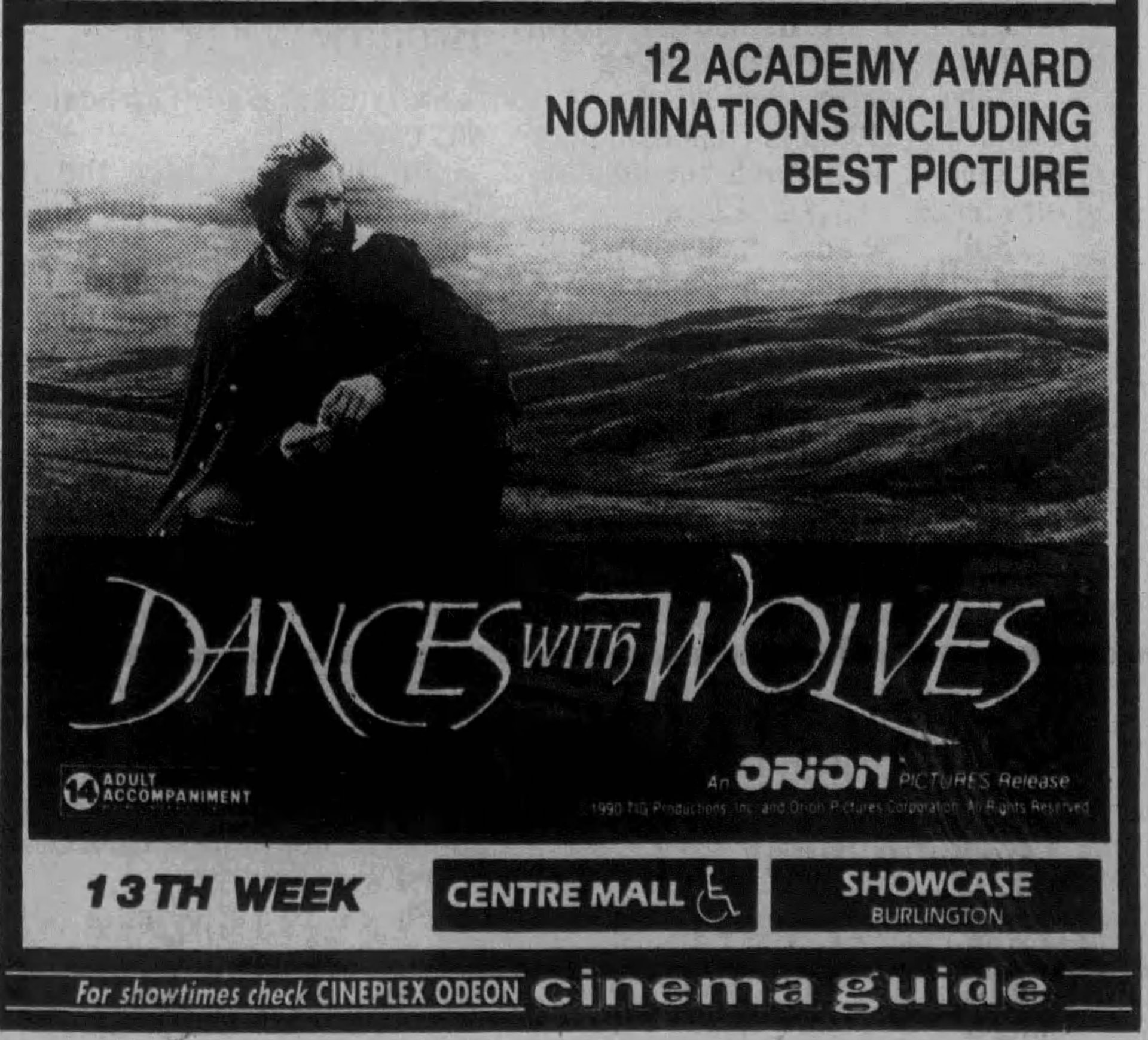 Newspaper ad for Dances with Wolves: Kevin Costner in a long coat on a windswept prairie, under '12 Academy Award nominations including Best Picture'. Rated 14 Adult Accompaniment, an Orion Pictures release, in its 13th week at Centre Mall and Showcase Burlington, with the Cineplex Odeon cinema guide line.